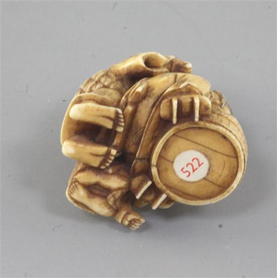 A Japanese ivory okimono of a family group, Meiji period, 4.5cm high (no. 522)